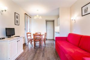 Televízia a/alebo spoločenská miestnosť v ubytovaní La Résidence du Golf - maeva Home - Appartement 2 pièces 4 personnes - Confort MAE-5448