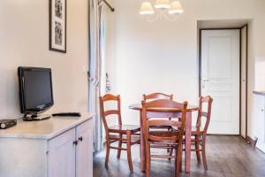 Kuchyňa alebo kuchynka v ubytovaní La Résidence du Golf - maeva Home - Appartement 2 pièces 4 personnes - Confort MAE-5448