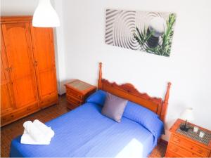 Posteľ alebo postele v izbe v ubytovaní ConilPlus apartments AZORIN II