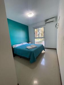 Departamentos Libertador tesisinde bir odada yatak veya yataklar