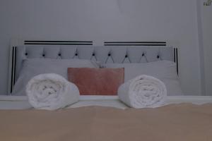 Postel nebo postele na pokoji v ubytování Saas Homestay