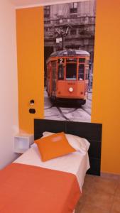 Posteľ alebo postele v izbe v ubytovaní Hotel Nuova Orchidea
