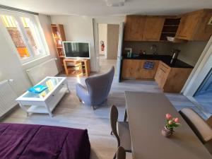 Kuchyň nebo kuchyňský kout v ubytování Appartement entier dans cour intérieure