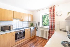 Kuchyň nebo kuchyňský kout v ubytování Allgäu-Heimat + 4 fotografie