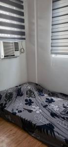 Postel nebo postele na pokoji v ubytování Camella Staycation