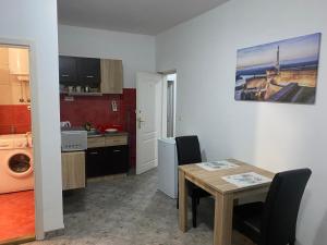 Kuchyň nebo kuchyňský kout v ubytování Rooms Jajinci
