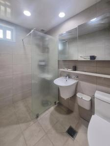 a bathroom with a toilet and a sink and a shower at [My Place] max8ppl/3rooms/3Qbeds/Migeum stn/SNUBH in Seongnam