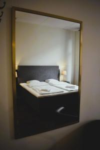 Postel nebo postele na pokoji v ubytování Best Guest Hotell och Vandrarhem