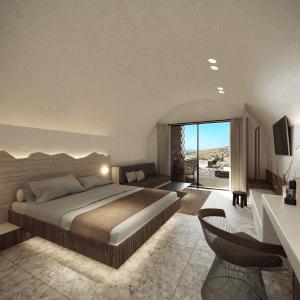 a bedroom with a large bed and a living room at Sun Aeriko in Tinos