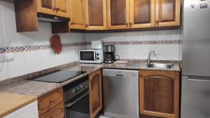 Kuchyňa alebo kuchynka v ubytovaní Apartamento Vista Magnifica