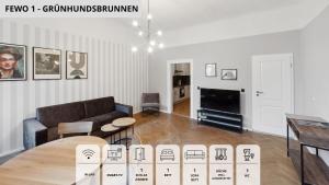a living room with a couch and a table at NEU SandAPART32 - 3 tolle FeWos von 1-8 Pers mitten in der Altstadt in Bamberg