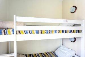 Ένα ή περισσότερα κρεβάτια σε δωμάτιο στο Résidence Les Belles Rives - maeva Home - Appartement 2 pièces 7 personnes - Confort MAE-2224 +17 φωτογραφίες