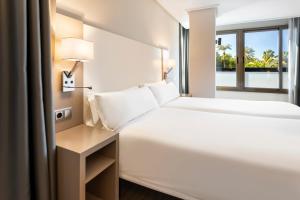Postel nebo postele na pokoji v ubytování B&B HOTEL Cartagena Cartagonova + 33 fotografií