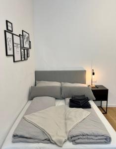 Säng eller sängar i ett rum på Modernes Apartment im Zentrum von Karlsruhe