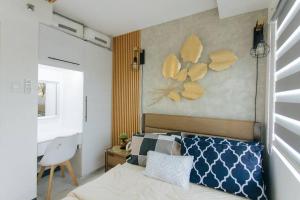Ένα ή περισσότερα κρεβάτια σε δωμάτιο στο A2J Luxury 2BR Near Il Corso & SM Seaside Cebu