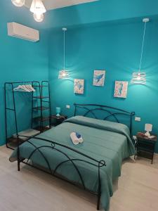 Postel nebo postele na pokoji v ubytování BARI Giulia Rooms
