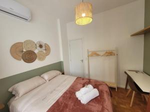 Tempat tidur dalam kamar di Apartamento com localização privilegiada no Flamengo
