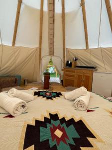 Postel nebo postele na pokoji v ubytování Tipi Apachen