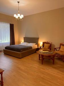 Postel nebo postele na pokoji v ubytování SPA&Hotel MŪSA PARADISE + 37 fotografií