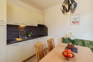 Kuchyň nebo kuchyňský kout v ubytování Hotel Törggelehof