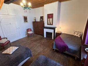 Posteľ alebo postele v izbe v ubytovaní Maison dans la magnifique village de Montjoi