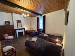Posteľ alebo postele v izbe v ubytovaní Maison dans la magnifique village de Montjoi