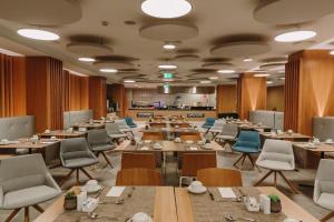 a large dining room with tables and chairs at Don Gregory by Dunas - Adults Only in San Agustin