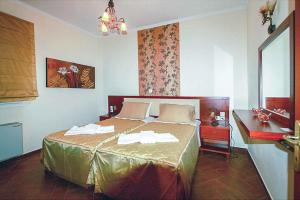 Ένα ή περισσότερα κρεβάτια σε δωμάτιο στο Villa Romanza Beta +15 φωτογραφίες