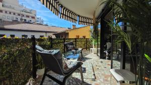 Ein Balkon oder eine Terrasse in der Unterkunft Terrasa de Mercado Central