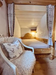Ein Bett oder Betten in einem Zimmer der Unterkunft Haus Silberwang