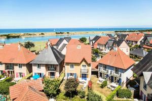 an aerial view of a residential neighborhood with houses at Les maisons de Port Guillaume - maeva Home - Maison 3 pièces 6 personnes - Confort MAE-3464 in Dives-sur-Mer +18 photos