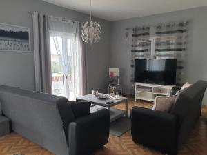A television and/or entertainment centre at Bei Kosta