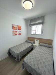 Posteľ alebo postele v izbe v ubytovaní Alpen1 Peñiscola Residencial