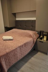 Postel nebo postele na pokoji v ubytování Villa Mangata Apartments + 63 fotografií