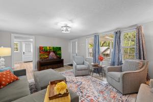 a living room with a couch and chairs at Downtown Dahlonega Destination in Dahlonega