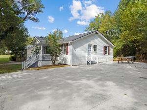 a house with a large driveway in front of it at Downtown Dahlonega Destination in Dahlonega