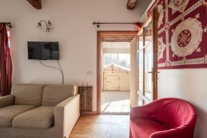 A seating area at Corte Cristina & Suites