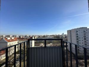a balcony with a view of a city at First Green Żoliborz Apartment 9 in Warsaw