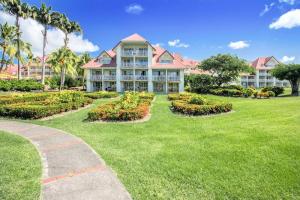 a large house with a garden in front of it at Village Sainte Luce, Martinique - maeva Home - Studio 3 personnes - Prestige MAE-8324 in Sainte-Luce