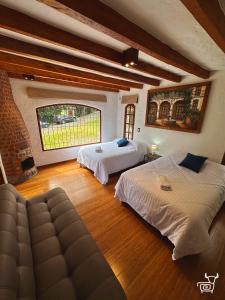 Katil atau katil-katil dalam bilik di Hacienda Turística La Morería