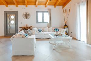 Posezení v ubytování Villa Theoni