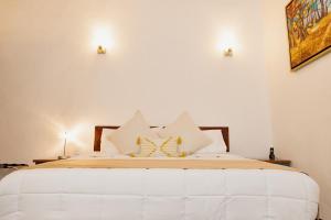 Postel nebo postele na pokoji v ubytování La Casona de Josefa