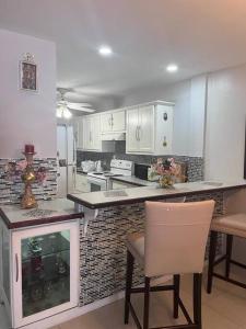 A kitchen or kitchenette at Townhouse in Diego Martin