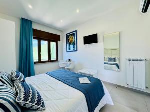 Postel nebo postele na pokoji v ubytování Vera Gioia Rooms de Charme