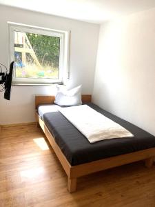 Postel nebo postele na pokoji v ubytování Monteurwohnung Dornfelder