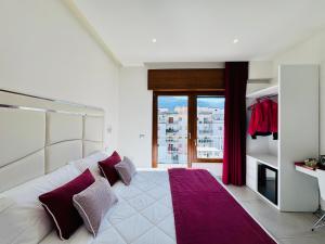 Postel nebo postele na pokoji v ubytování Vera Gioia Rooms de Charme
