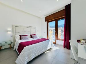 Postel nebo postele na pokoji v ubytování Vera Gioia Rooms de Charme