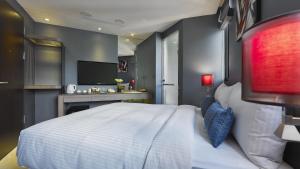 Ліжко або ліжка в номері Beauty Hotels Taipei - B7 Journey