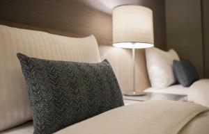 Ліжко або ліжка в номері Beauty Hotels Taipei - B7 Journey