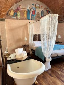 Posteľ alebo postele v izbe v ubytovaní Luxury Corte dei Nobili